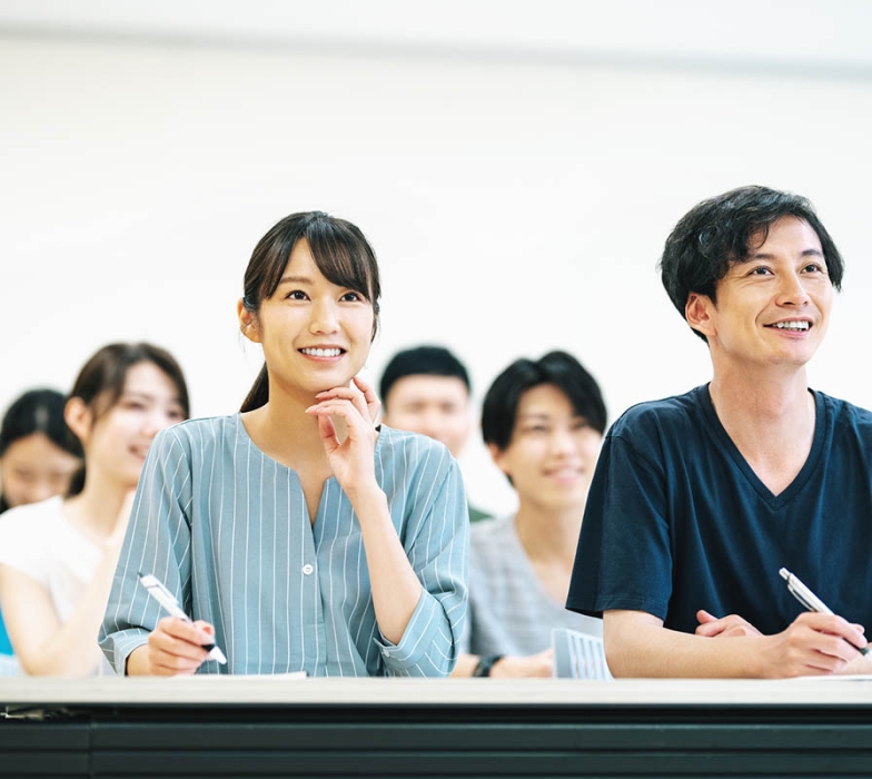 笑顔でセミナーを受ける参加者